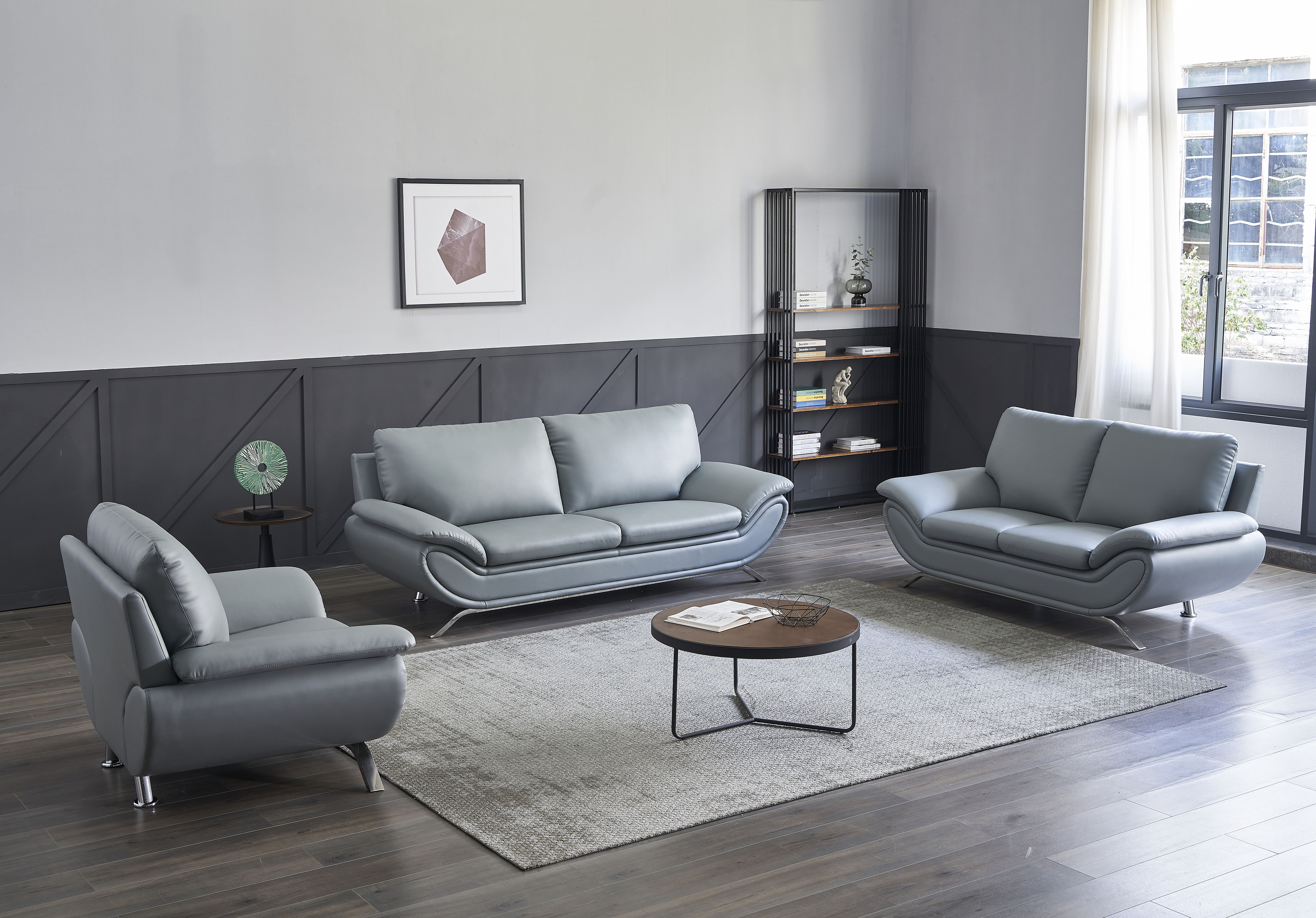 grey sued and black leather sofa